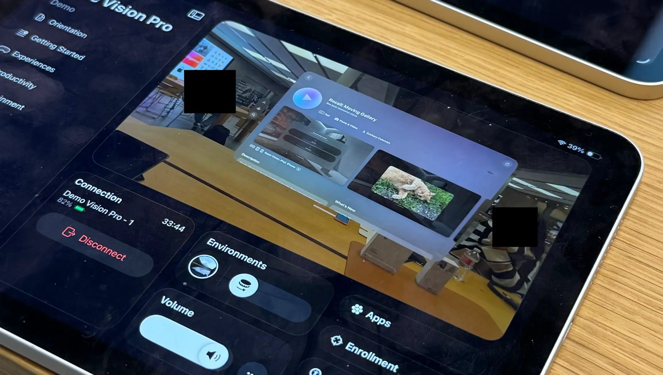 Image of the iPad which is used to direct Vision Pro demos. On it there is a small window showing the perspective of the Vision Pro user (me) looking at my photo memory app, Recall.